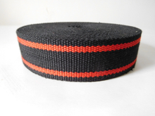Secondary color aramid fiber webbing for fire safety