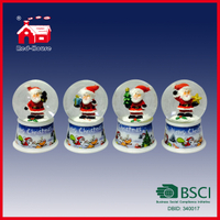 Glittering eldnacele swirling Angel Christmas Resin Snow Globe with Blowing Snow and LED Lights for