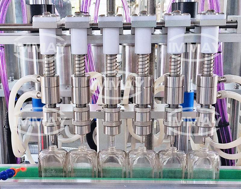 Vacuum Bottle Filling_Machines Manufacturer الشركة المصنعة لآلات تعبئة الزجاجات الفارغة