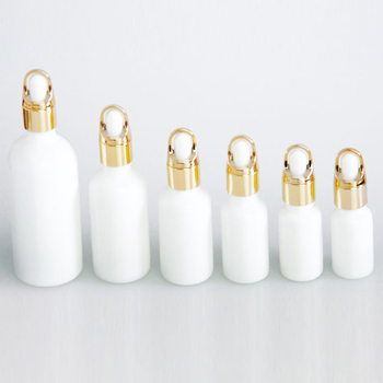 Белые стеклянные бутылки капельницы