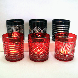 horn shape embossed black and red glass candle jar