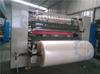 Slitting and rewinding machine for sealing tape