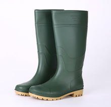 Green color plastic rain boots