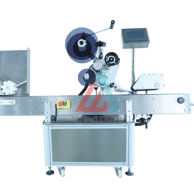 mesin pelabelan sirap botol ampul teknologi